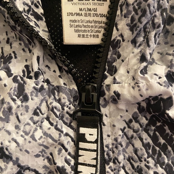 PINK wind breaker.  Zipper front. Blk/white snakeskin like pattern. M/L - Picture 2 of 3